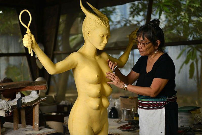 Arellano sculpting Inanna, taken by a photographer for Artfair Philippines 2016. Arellano sculpting Inanna, taken by a photographer for Artfair Philippines 2016.
