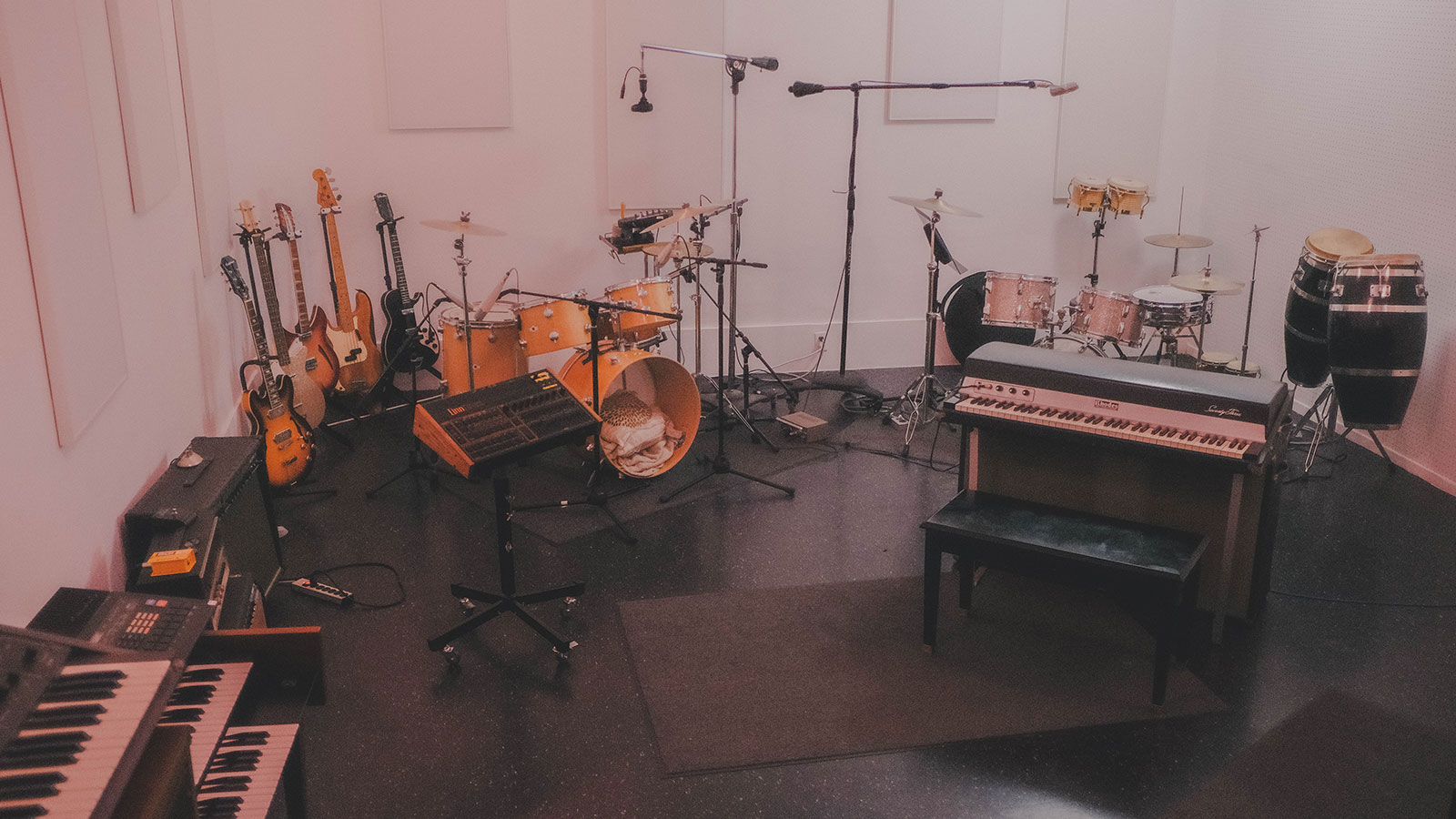 Studio A - A setup in the live room. There's a '70s Camco drum kit (back left) with close mics for a tighter '70s drum sound, and a '60s Rogers drum kit (back right) with a two-mic setup for authentic '60s "drum break" sound. Linn drum machine, Fender Rhodes stage electric piano and other various instruments. Studio A - A setup in the live room. There's a '70s Camco drum kit (back left) with close mics for a tighter '70s drum sound, and a '60s Rogers drum kit (back right) with a two-mic setup for authentic '60s "drum break" sound. Linn drum machine, Fender Rhodes stage electric piano and other various instruments.