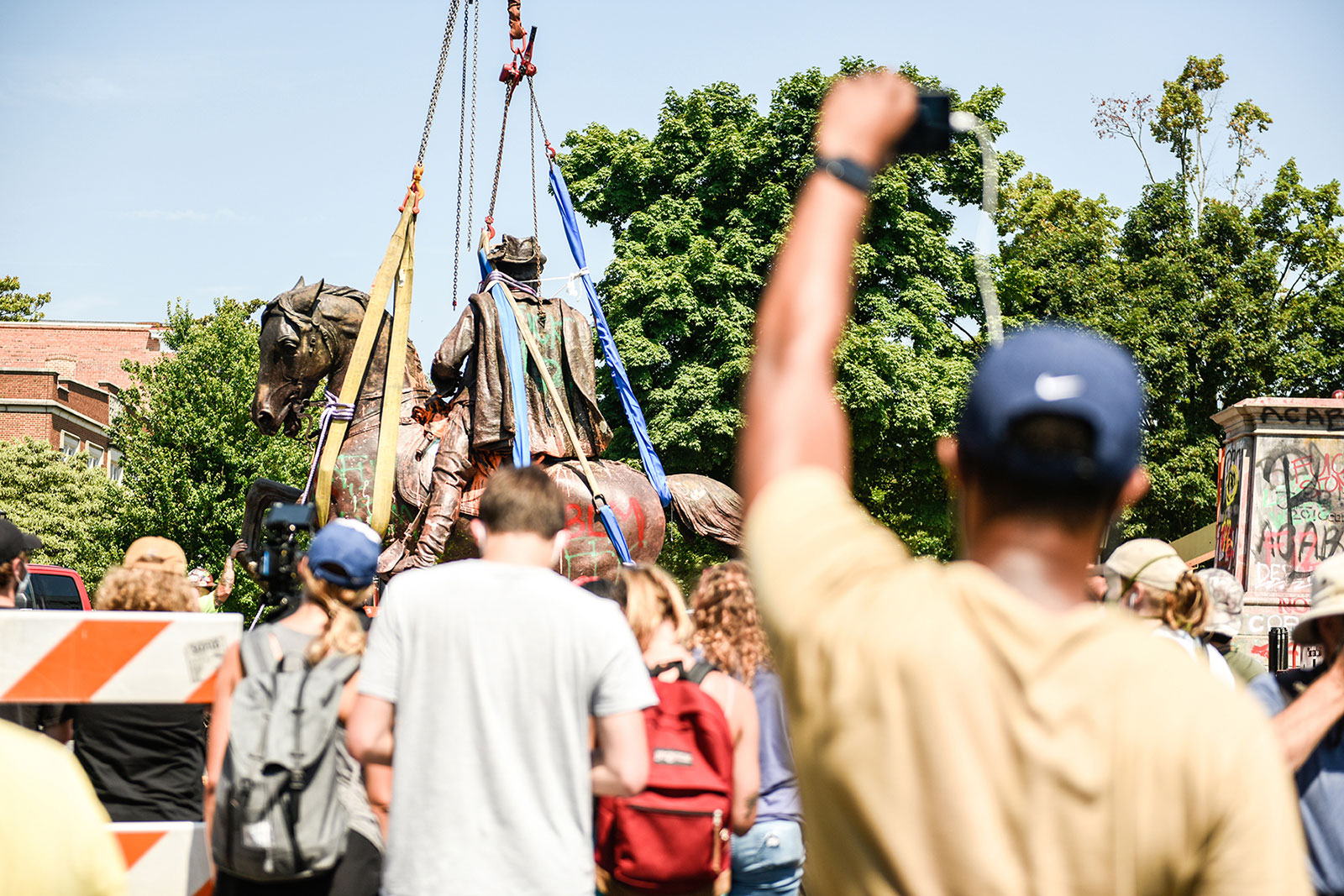 People congregate on Monument Avenue in Richmond, Virginia, to witness the removal of the J.E.B. Stuart Monument by city officials in July. Photo by <a href="https://evergib.com/">EVERGIB.</a> People congregate on Monument Avenue in Richmond, Virginia, to witness the removal of the J.E.B. Stuart Monument by city officials in July. Photo by <a href="https://evergib.com/">EVERGIB.</a>