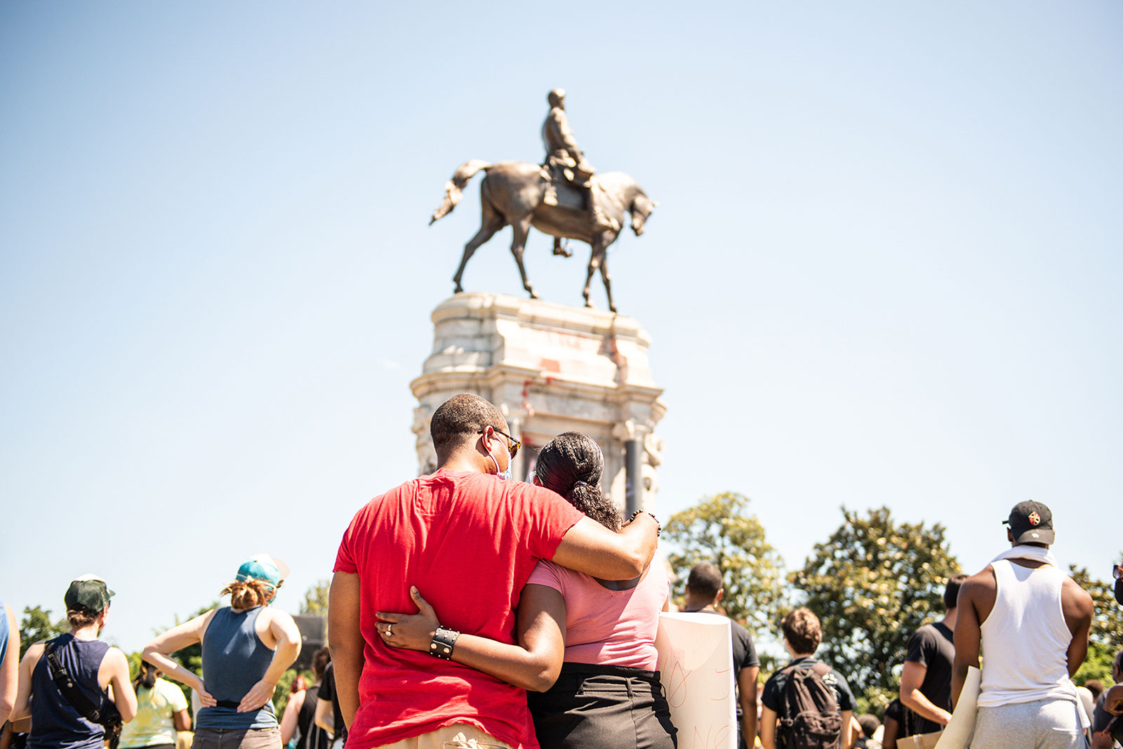 A couple embrace at the newly rebranded Marcus-David Peters Circle on Monument Avenue in Richmond. MDP Circle has recently become a celebrated community gathering spot. Photo by <a href="https://evergib.com/">EVERGIB.</a> A couple embrace at the newly rebranded Marcus-David Peters Circle on Monument Avenue in Richmond. MDP Circle has recently become a celebrated community gathering spot. Photo by <a href="https://evergib.com/">EVERGIB.</a>