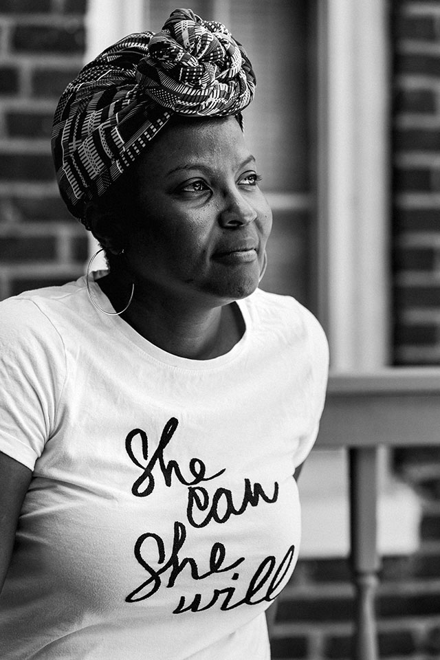 Angela Patton in a moment of quiet reflection outside her home. Patton is CEO of <a href="https://girlsforachange.org/">Girls for a Change</a>, a nonprofit youth development organization aimed at empowering Black girls and other girls of color. Photo by <a href="https://www.taniadelcarmen.com/">Tania del Carmen Fernández.</a> Angela Patton