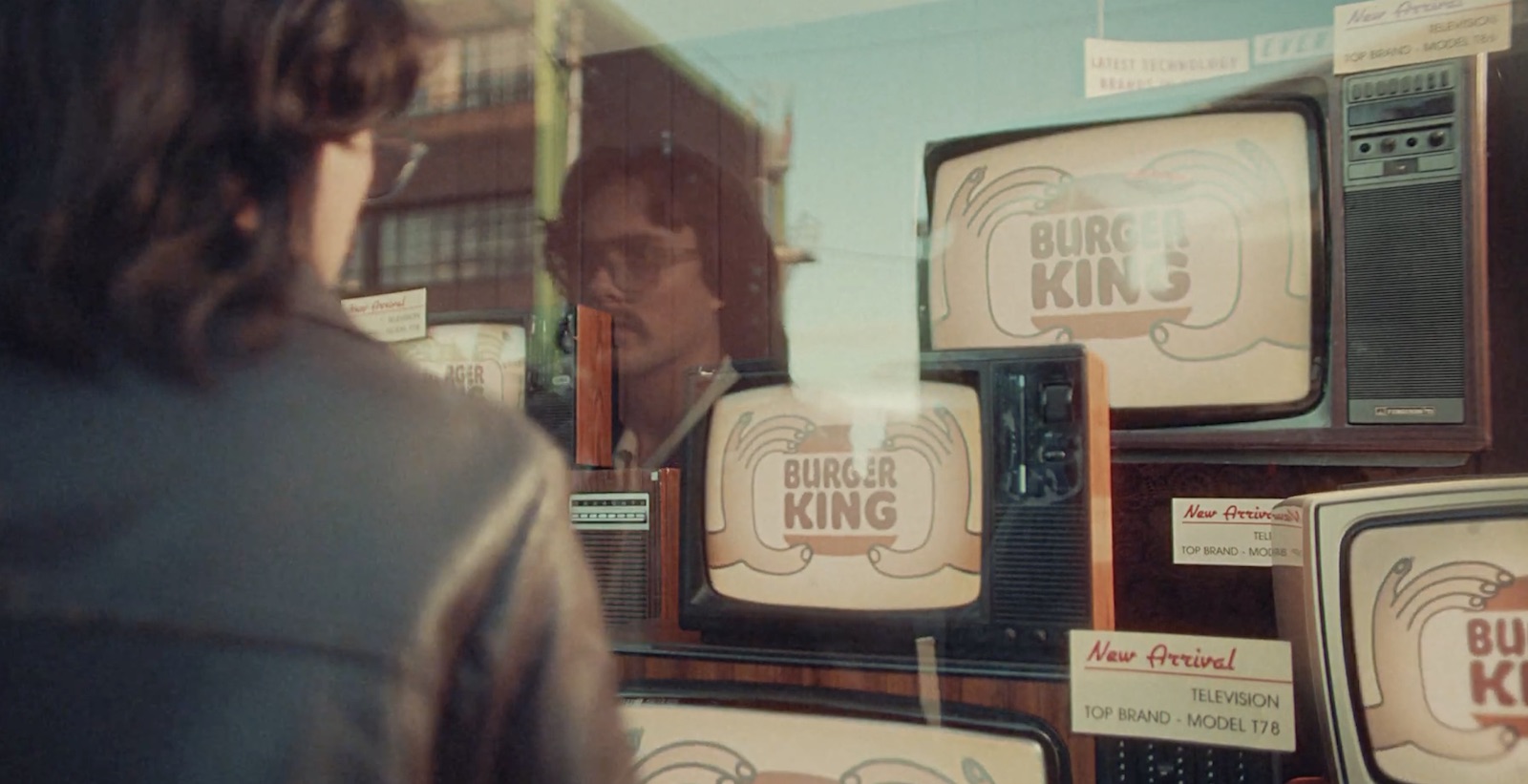 BK ads on TV shop screens